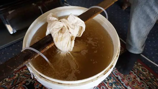 a bucket with dirty water
